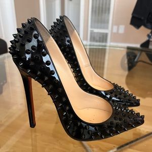 christian louboutin pigalle spike patent leather pumps
